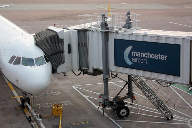 Manchester Airport has warned passengers they will face queues of up to 90 minutes this summer as it does not have enough staff (Alamy Stock Photo/PA)