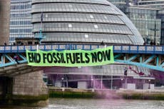 Extinction Rebellion protest: Activists block traffic on London’s Tower Bridge