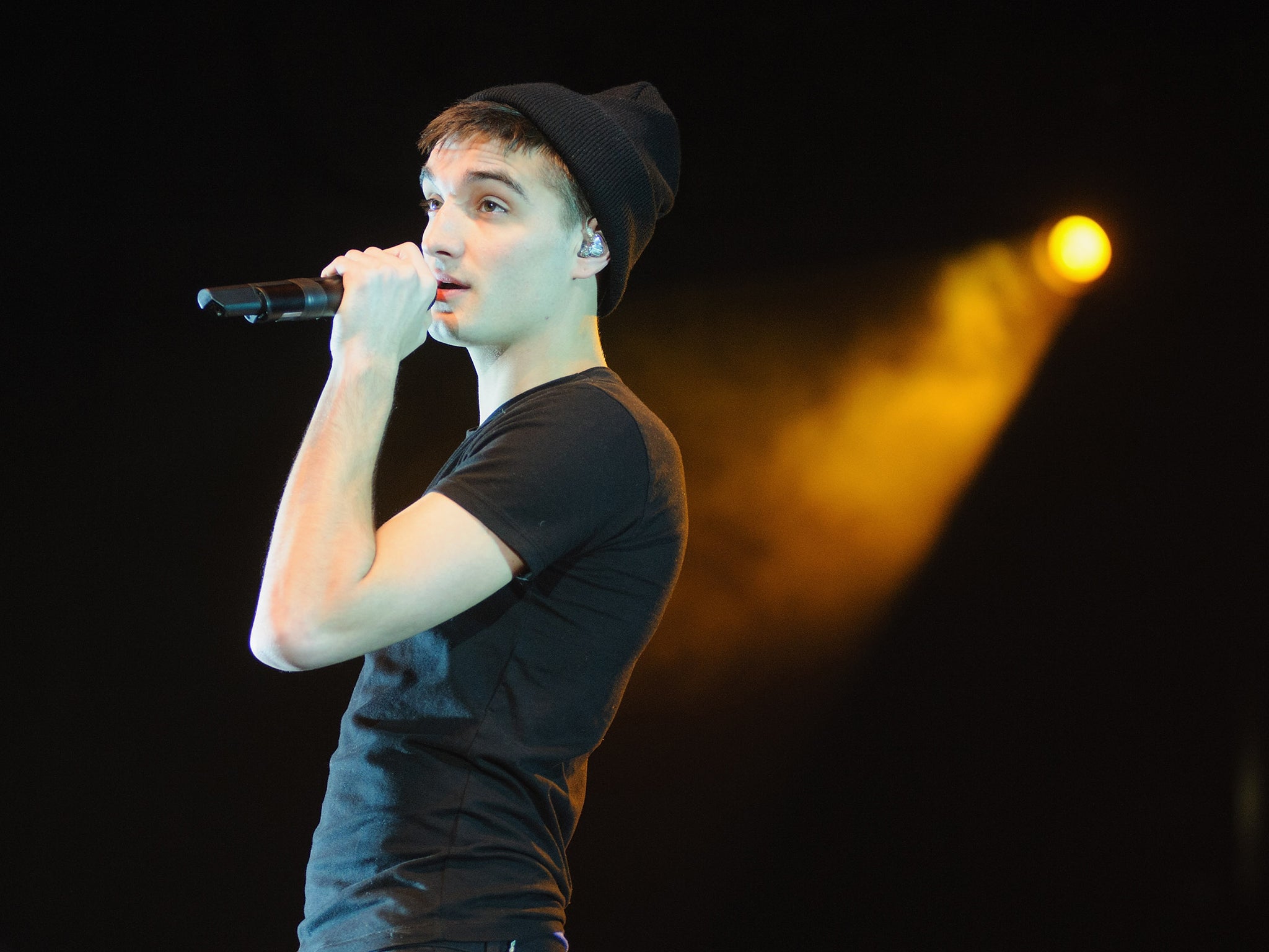 Parker on stage with The Wanted in 2013