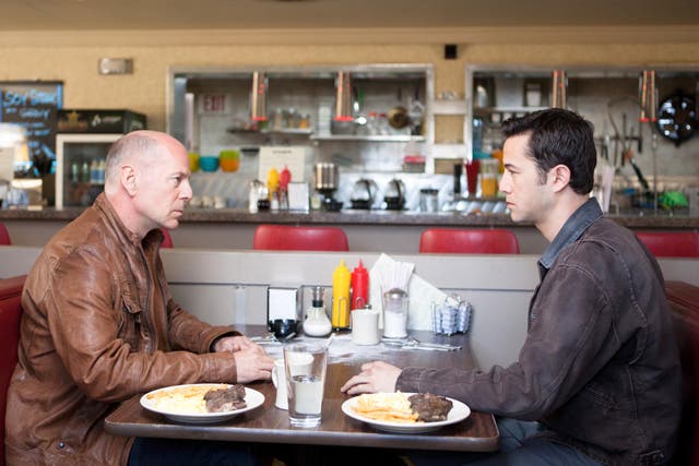<p>Bruce Willis and Joseph Gordon-Levitt in ‘Looper'</p>