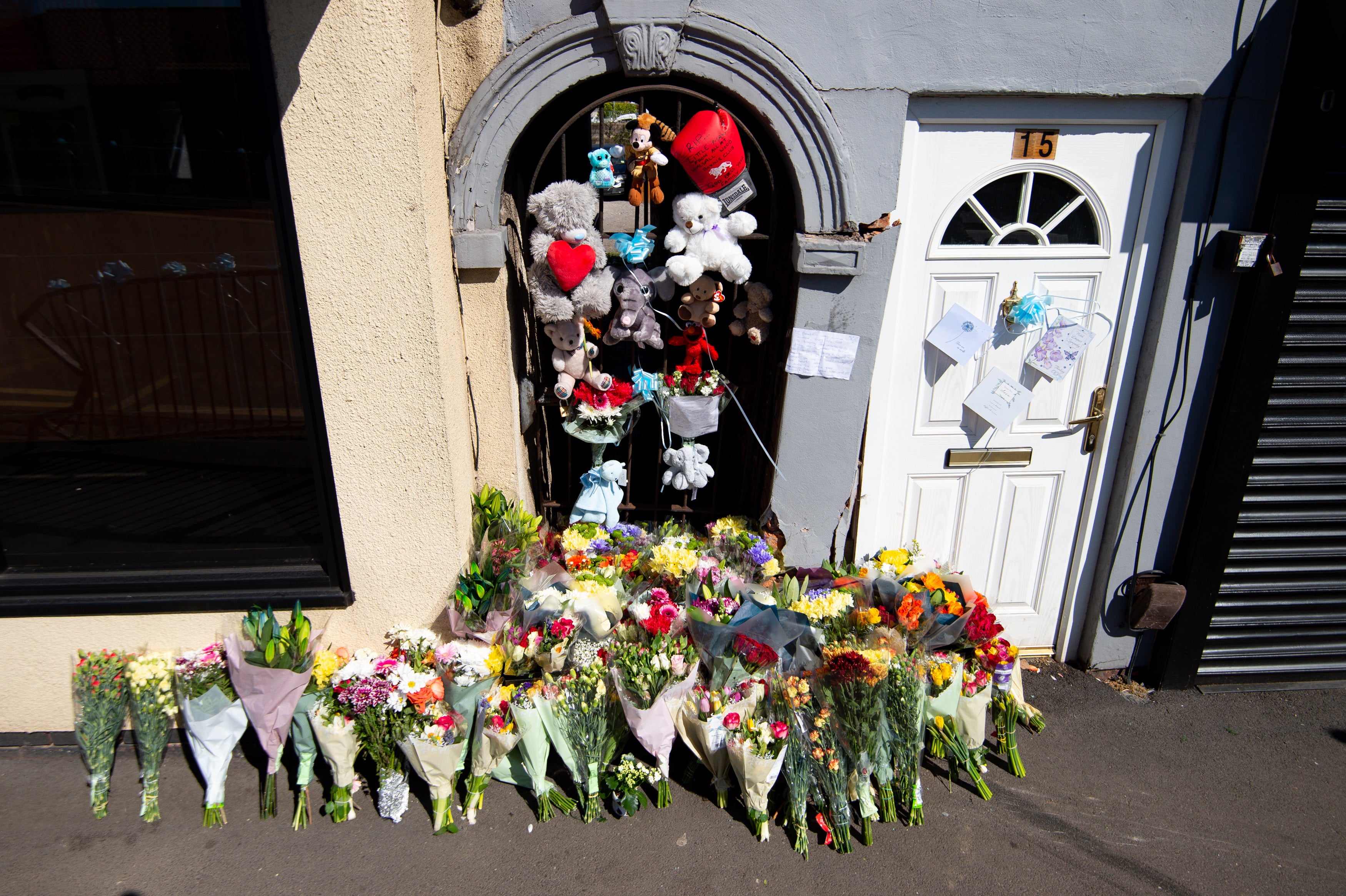 Flowers left at the scene on High Street, Brownhills, in tribute to Ciaran (Jacob King/PA)