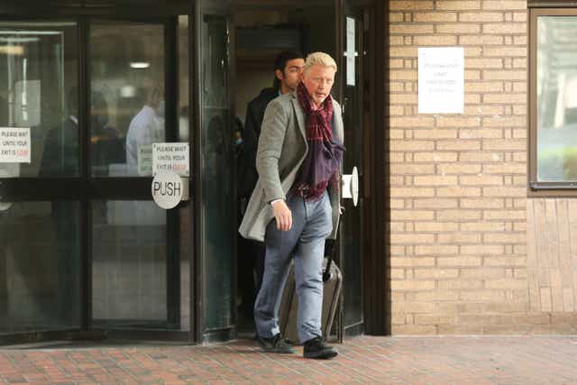 Boris Becker (front) with his son Noah leaving Southwark Crown Court, London (James Manning/PA)