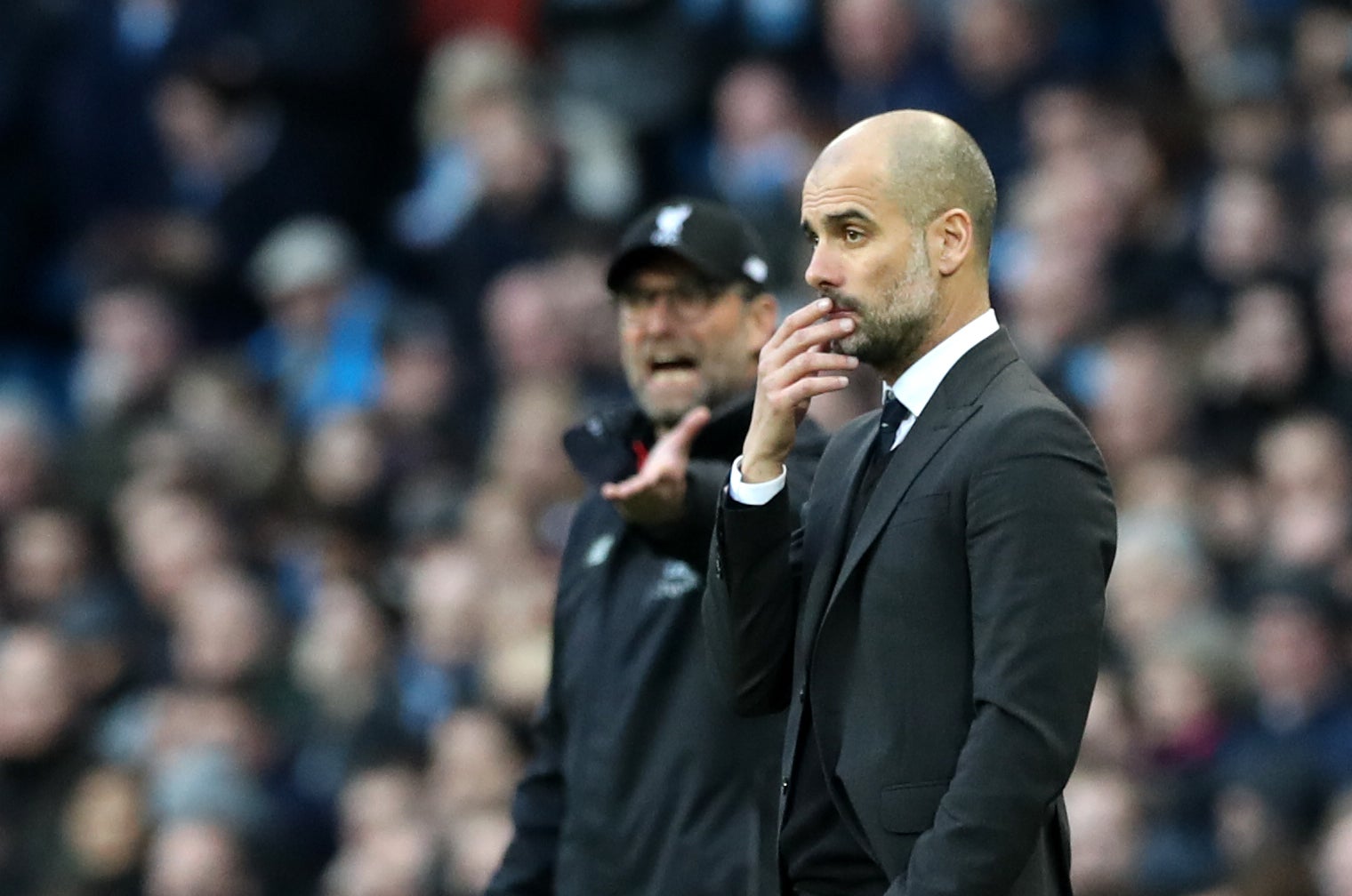 Pep Guardiola (right) says Jurgen Klopp (left) is his biggest rival (Martin Rickett/PA)