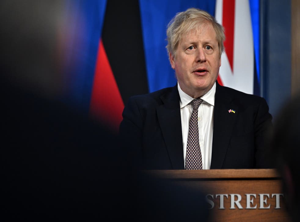 Boris Johnson during a press conference with German Chancellor Olaf Scholz (Ben Stansall/PA)