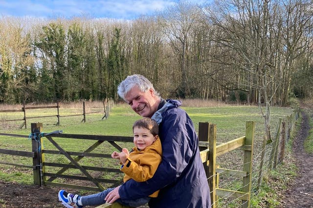Family handout of Richard Condie, 64 from Surrey, pictured with his grandson. His bowel cancer is stable after treatment with an experimental drug (PA)