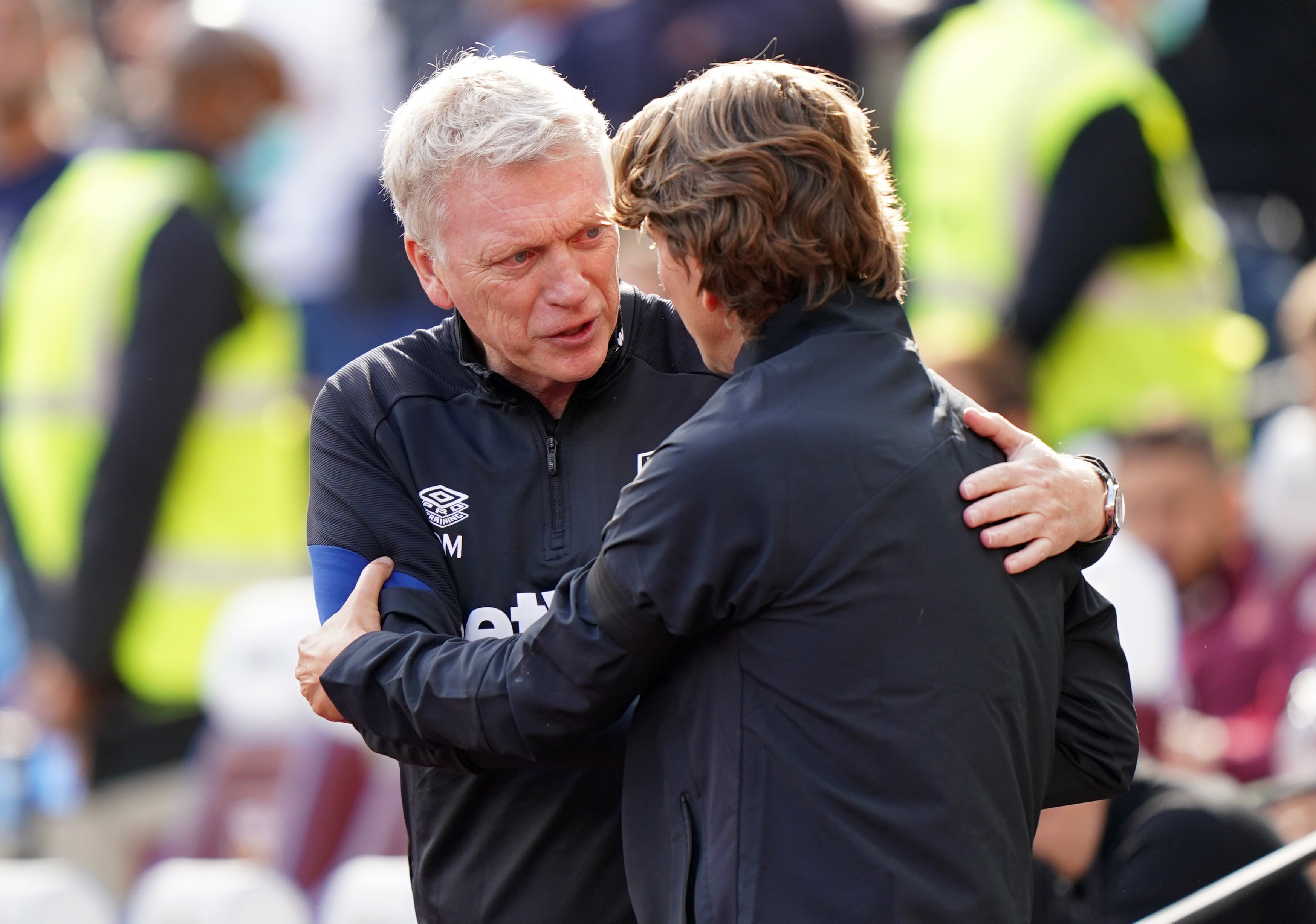 West Ham manager David Moyes, left, is balancing European commitments going into Sunday’s meeting with Thomas Frank’s Brentford (Tim Goode/PA)