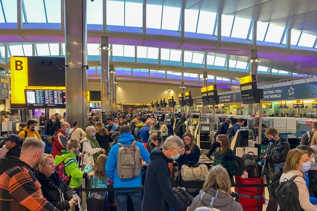 <p>Passengers check-in in terminal 2 at Heathrow Airport, west London as the getaway starts in earnest as schools close for Easter</p>