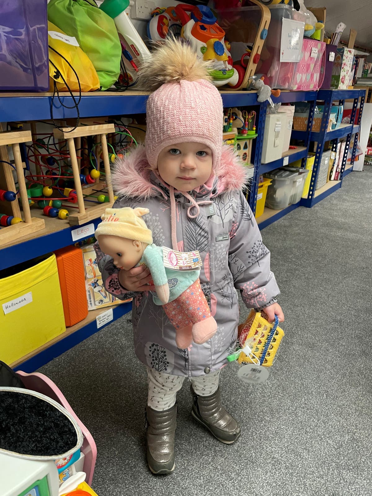 Refugee toddler excited to receive same doll she left in Ukraine from charity