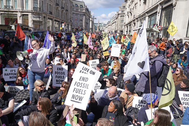 <p>Activists from Extinction Rebellion demonstrate on Regent Street in central London </p>
