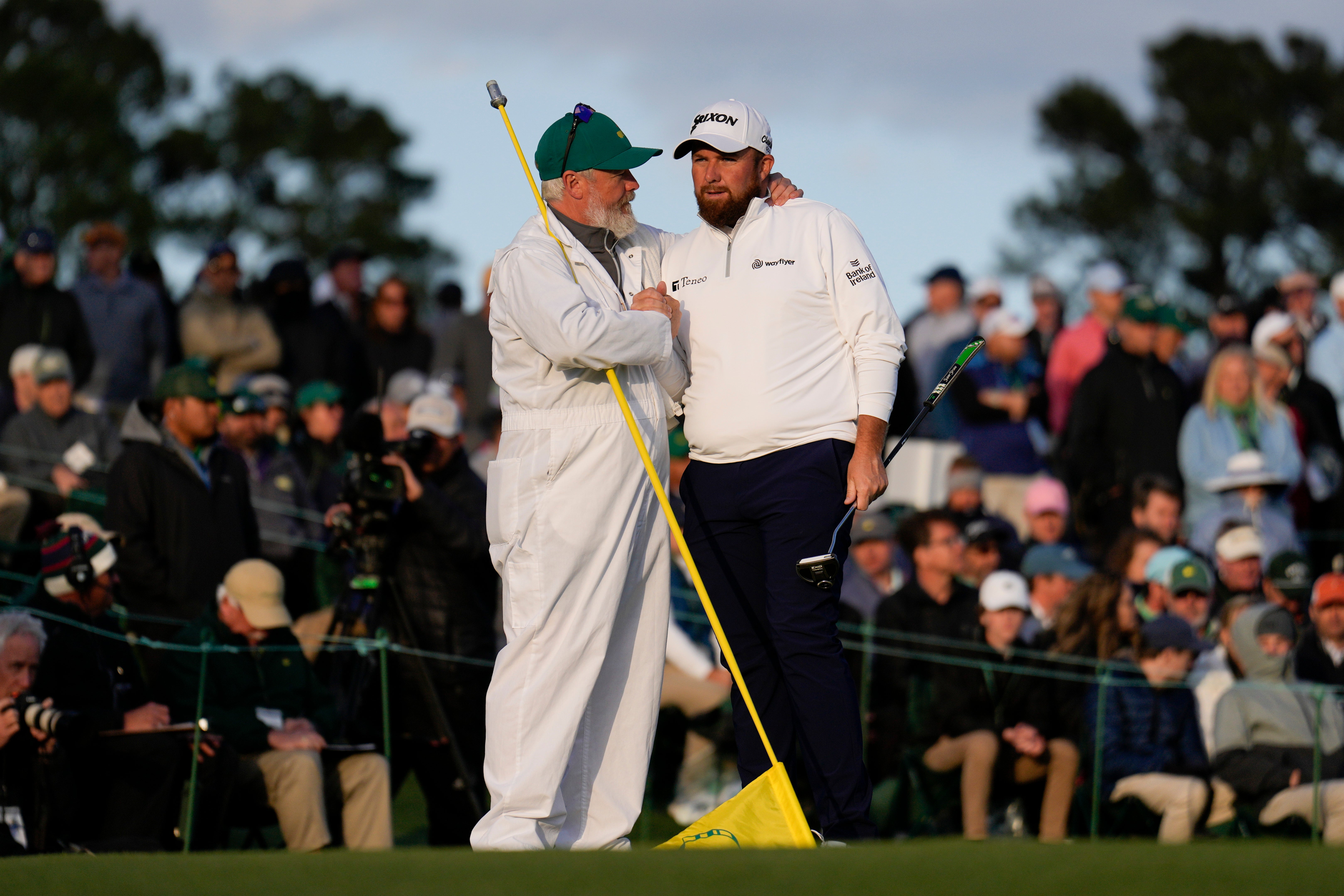 Shane Lowry and caddie Bo Martin after the third round of the Masters (Matt Slocum/AP)