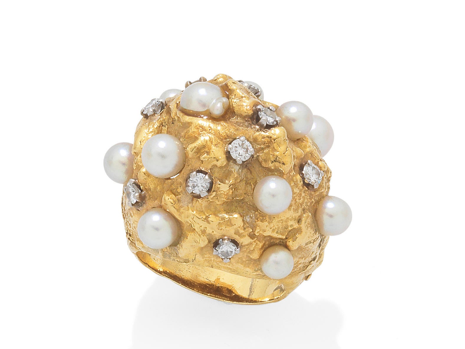 The cultured pearl and diamond encrusted ring given to Dame Joan Collins by Warren Beatty in 1960