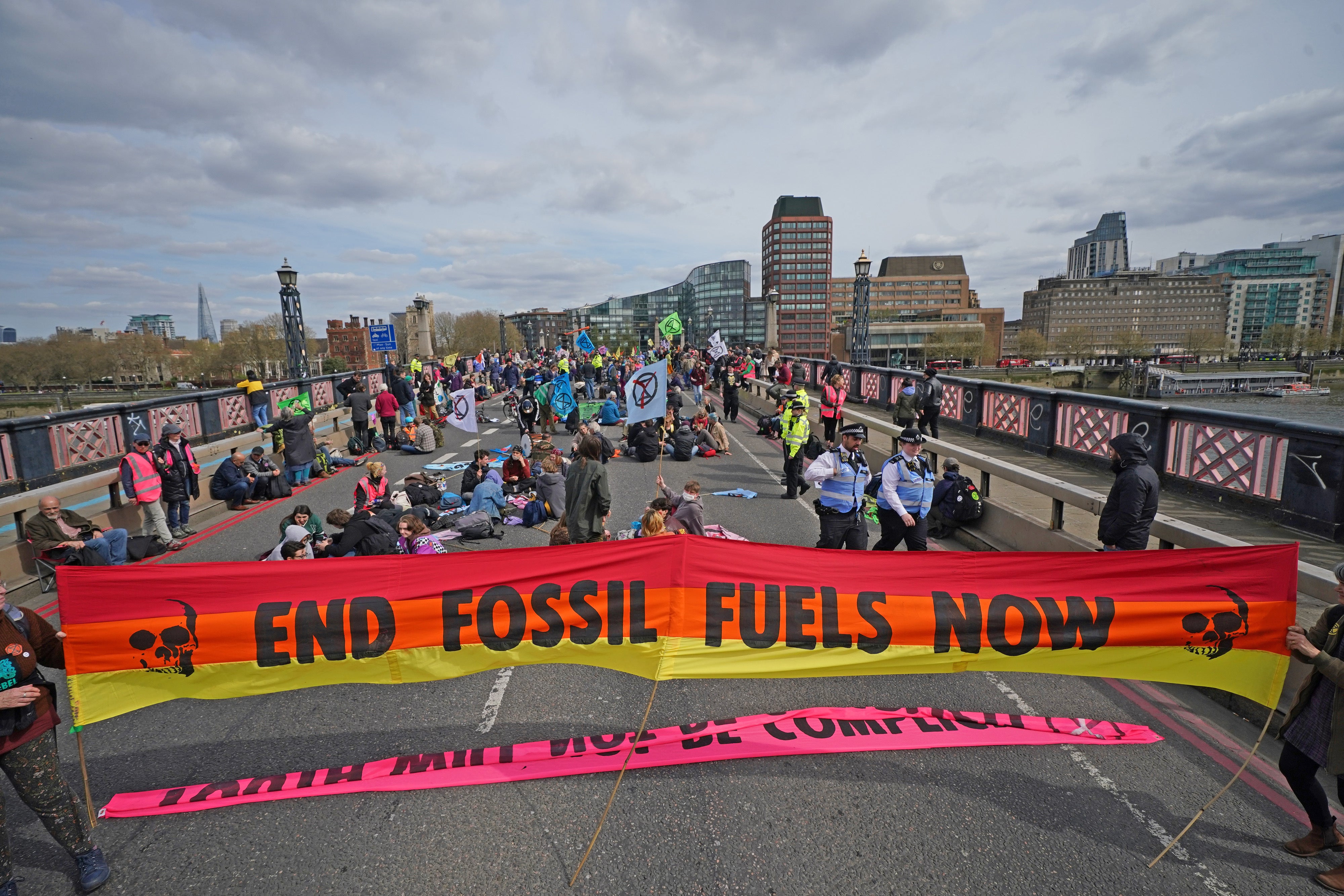 <p>Activists calling for the end of fossil fuels in London earlier this year Yui Mok/PA)</p>