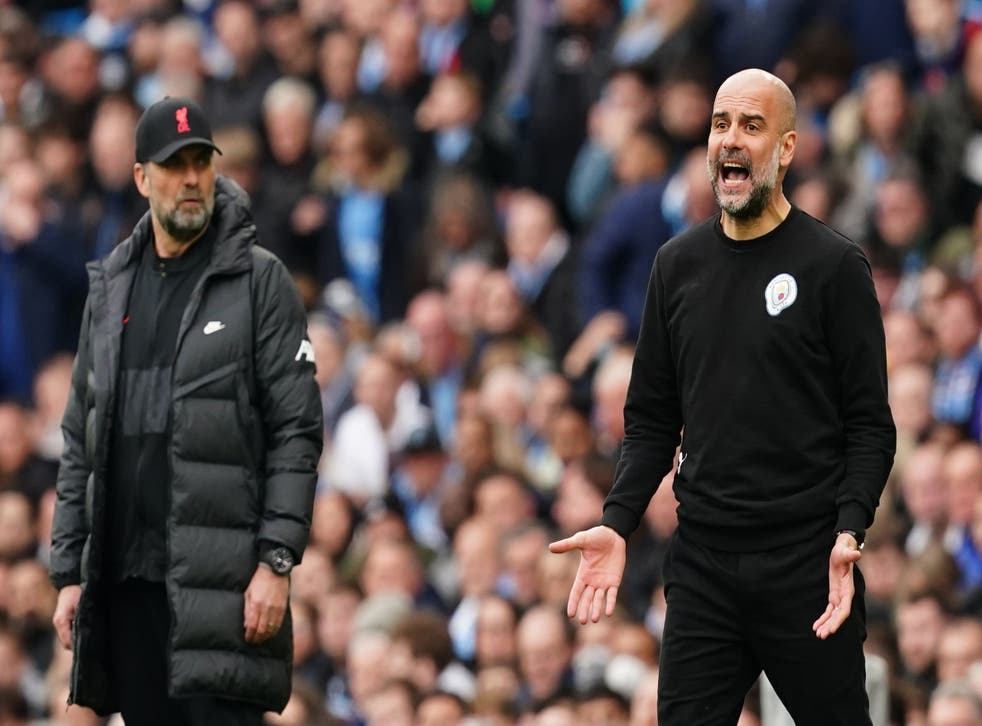 Manchester City manager Pep Guardiola (right) and Liverpool boss Jurgen Klopp saw their sides produce a high-quality 2-2 draw at the Etihad Stadium (Martin Rickett/PA)