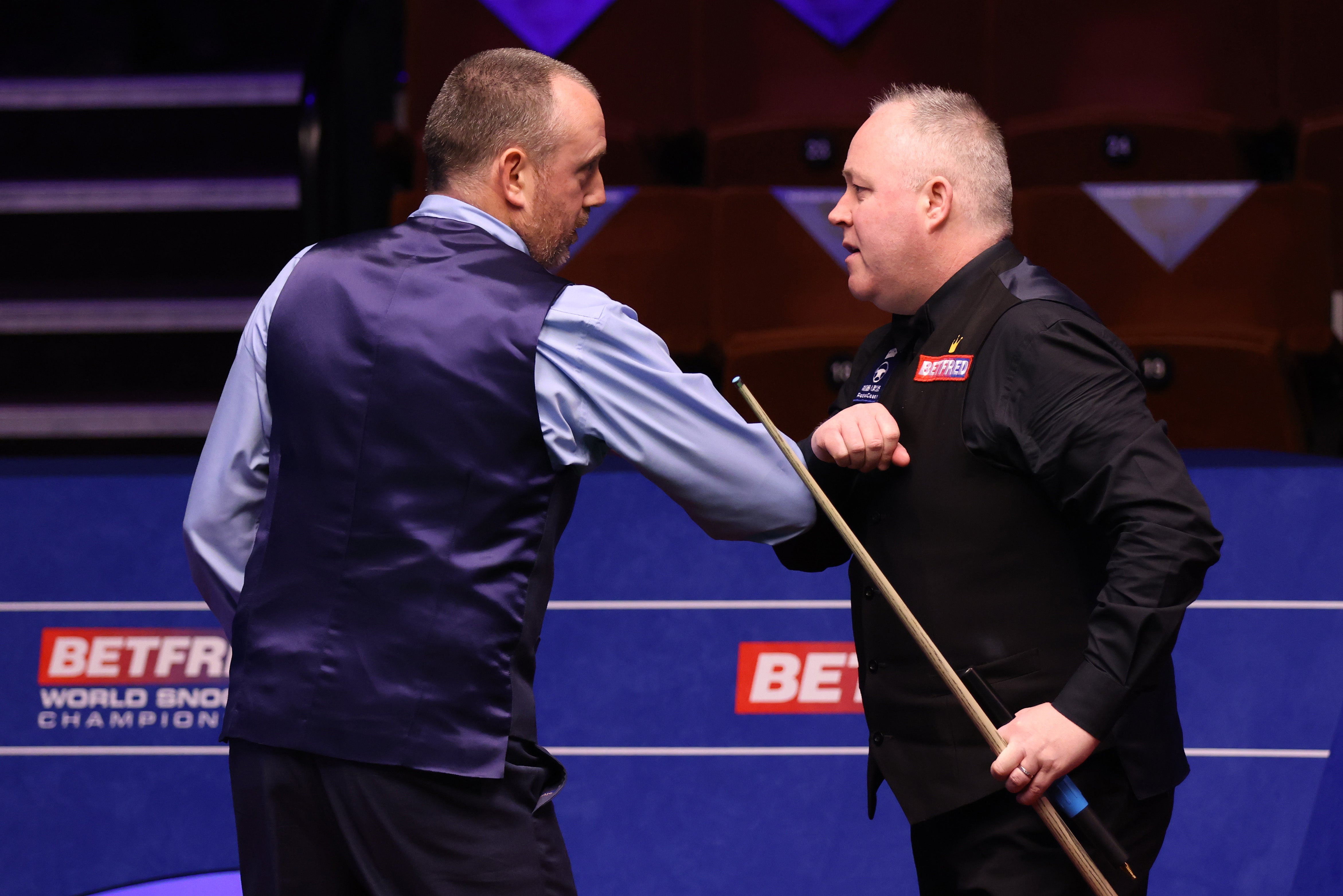 Mark Williams and John Higgins remain ranked in the top 10 (George Wood/PA)