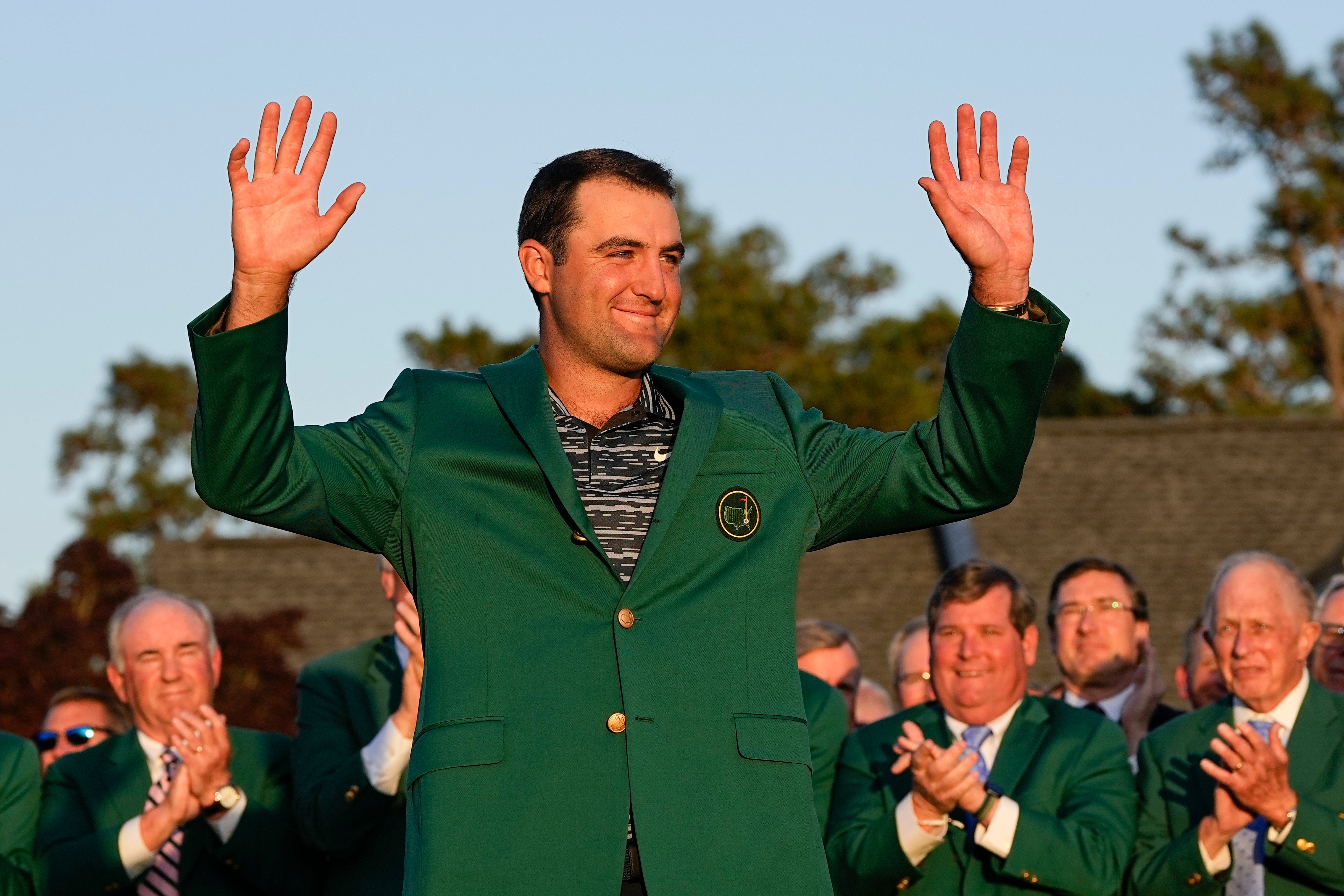 Scottie Scheffler celebrates with the Green Jacket at Augusta
