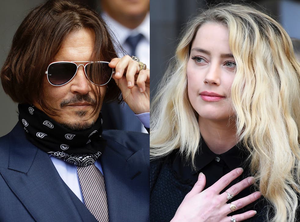<p>Johnny Depp and Amber Heard outside a London court in 2020</p>
