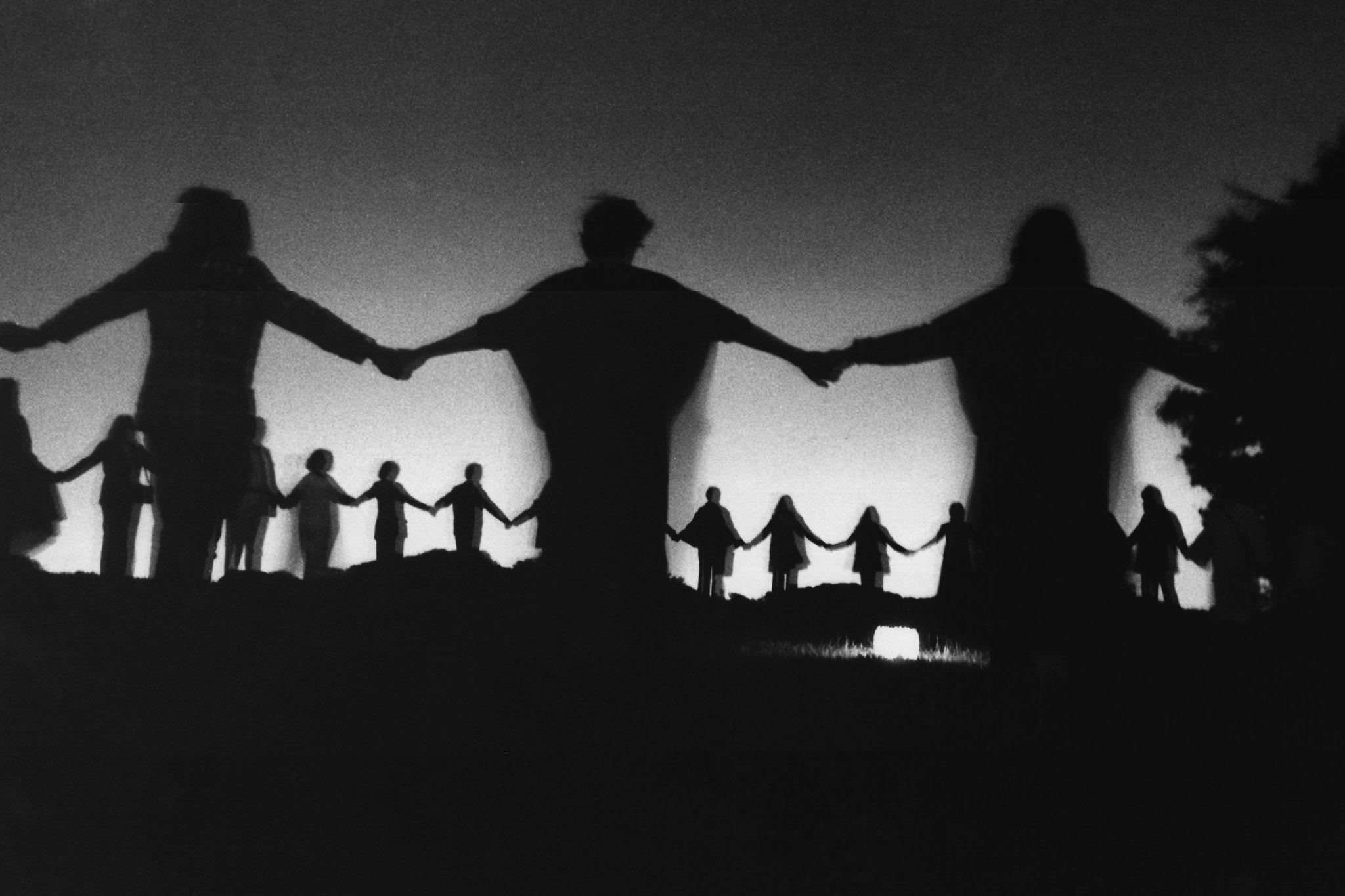 Druids holding hands during a ceremony on Hampstead Heath, north London, in 1971