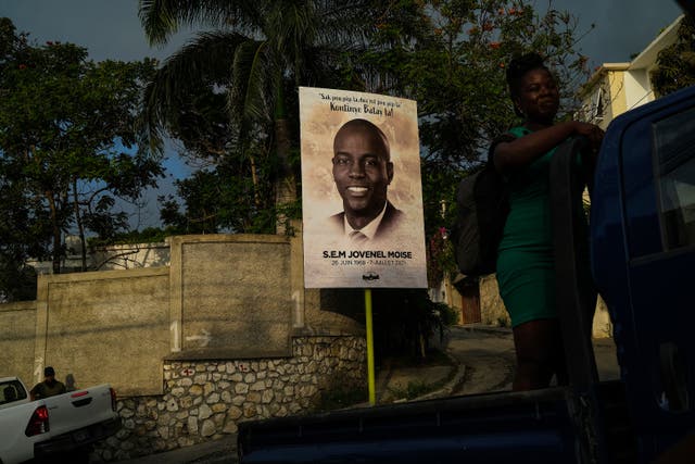 <p>A photo in Port-au-Prince memorialises Haitian president Jovenel Moise on 21 July, two weeks after his assassination</p>