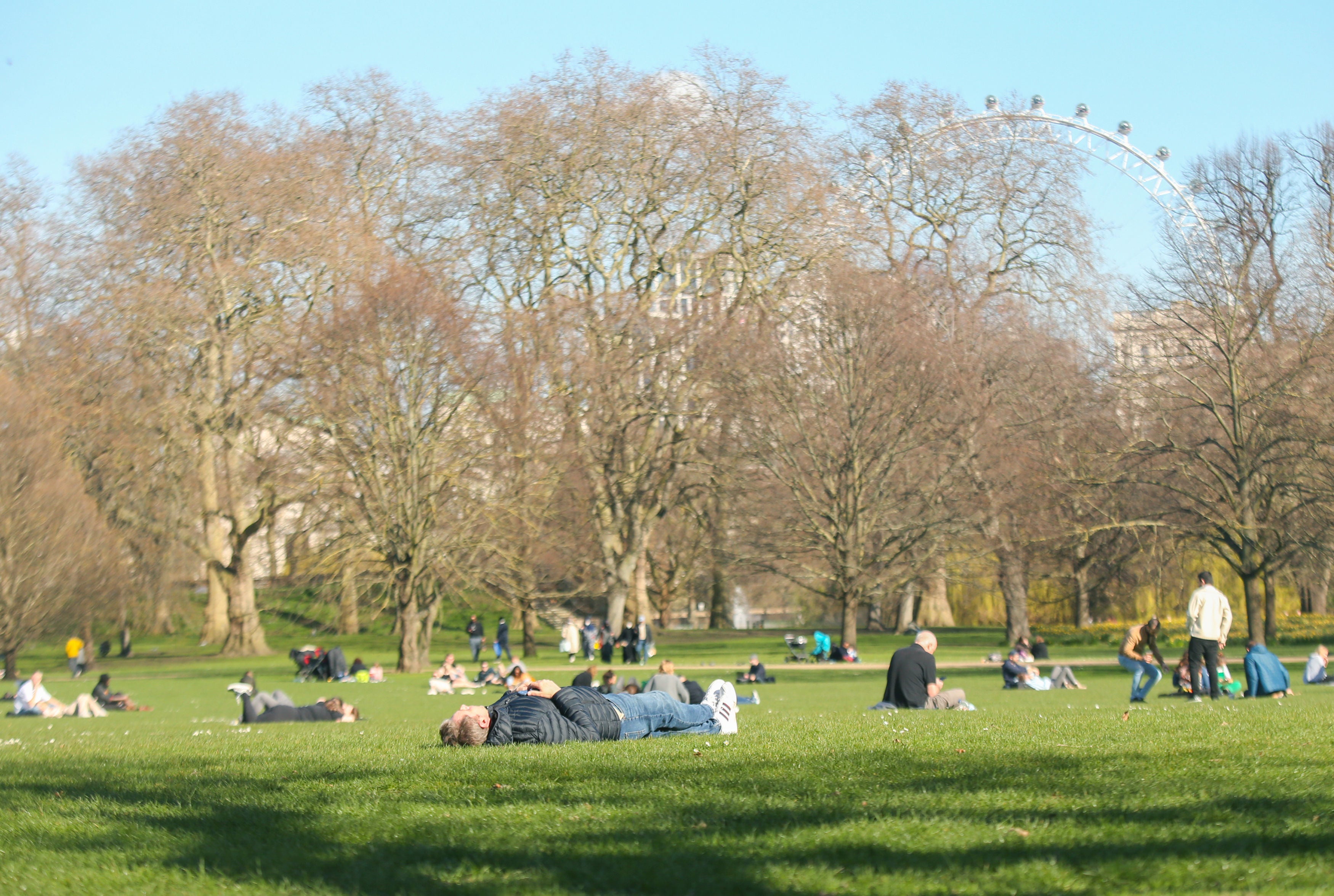 People in St James’ Park, central London, ahead of this week’s warm spell