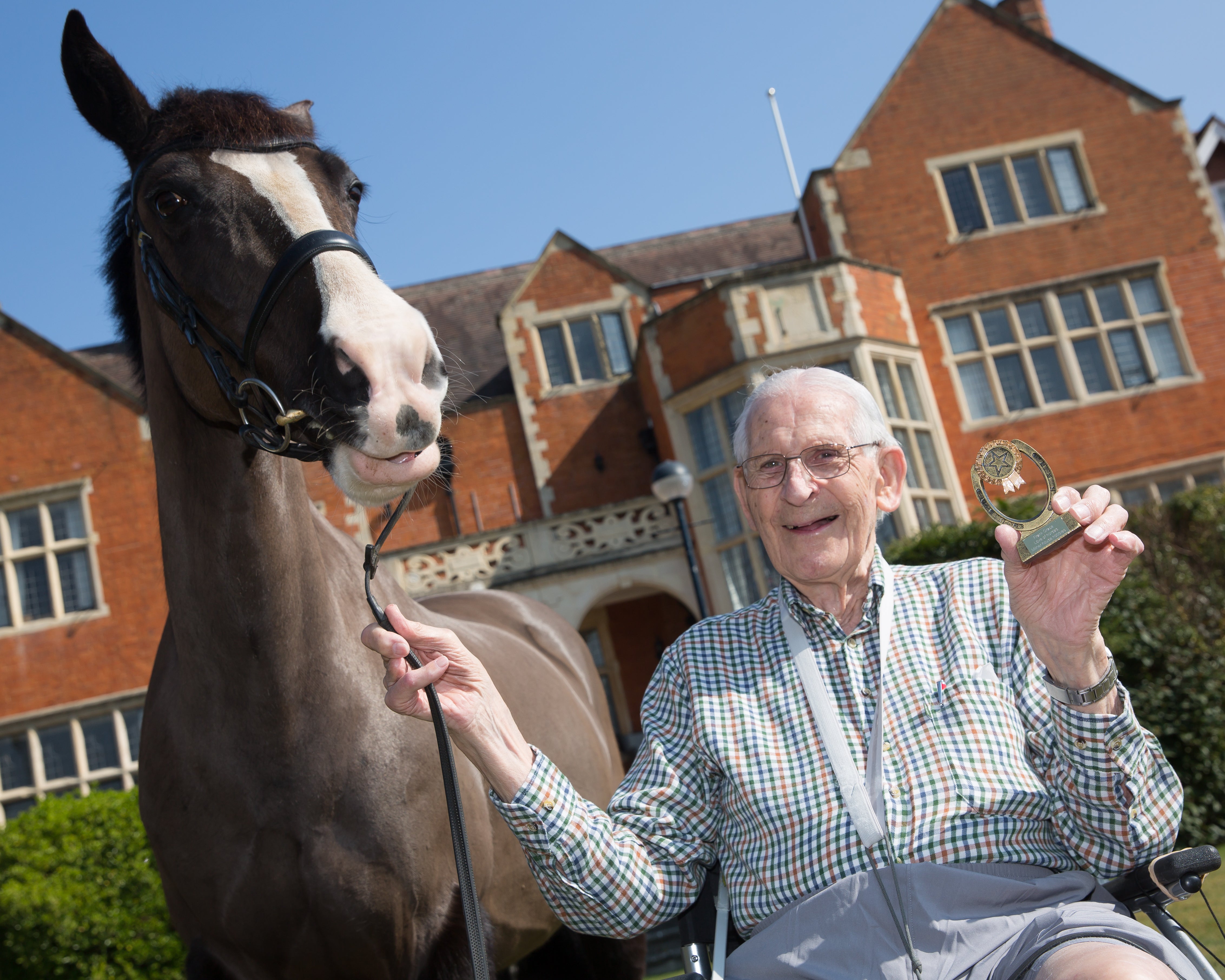 Frank Grace, 90, said meeting Rosie the horse made his day (Andrew Williams/Care UK/PA)