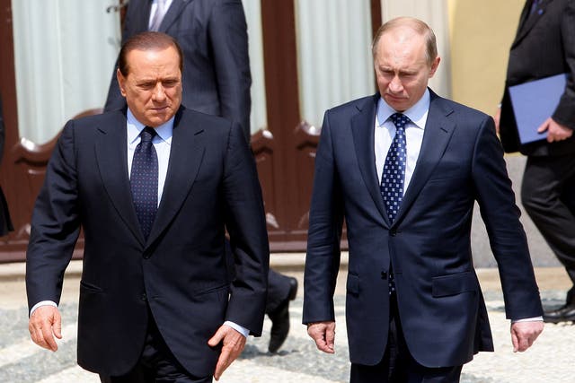 <p>File photo:  Italian prime minister Silvio Berlusconi (left) and Russian president Vladimir Putin meet in Lesmo, Italy, in 2010</p>
