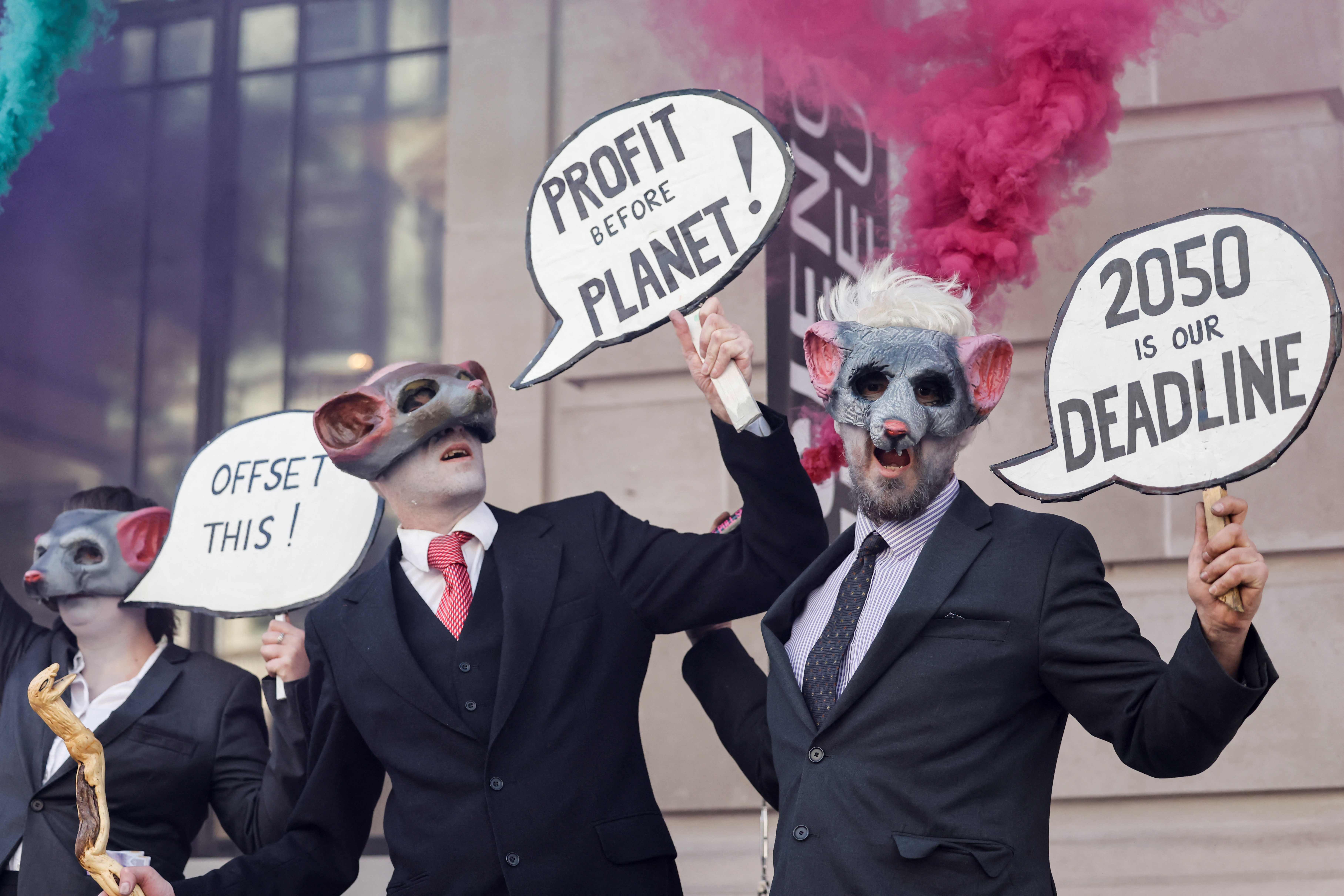 XR protesters dressed up as rats protest outside the Science Museum in London on 11 April, 2022