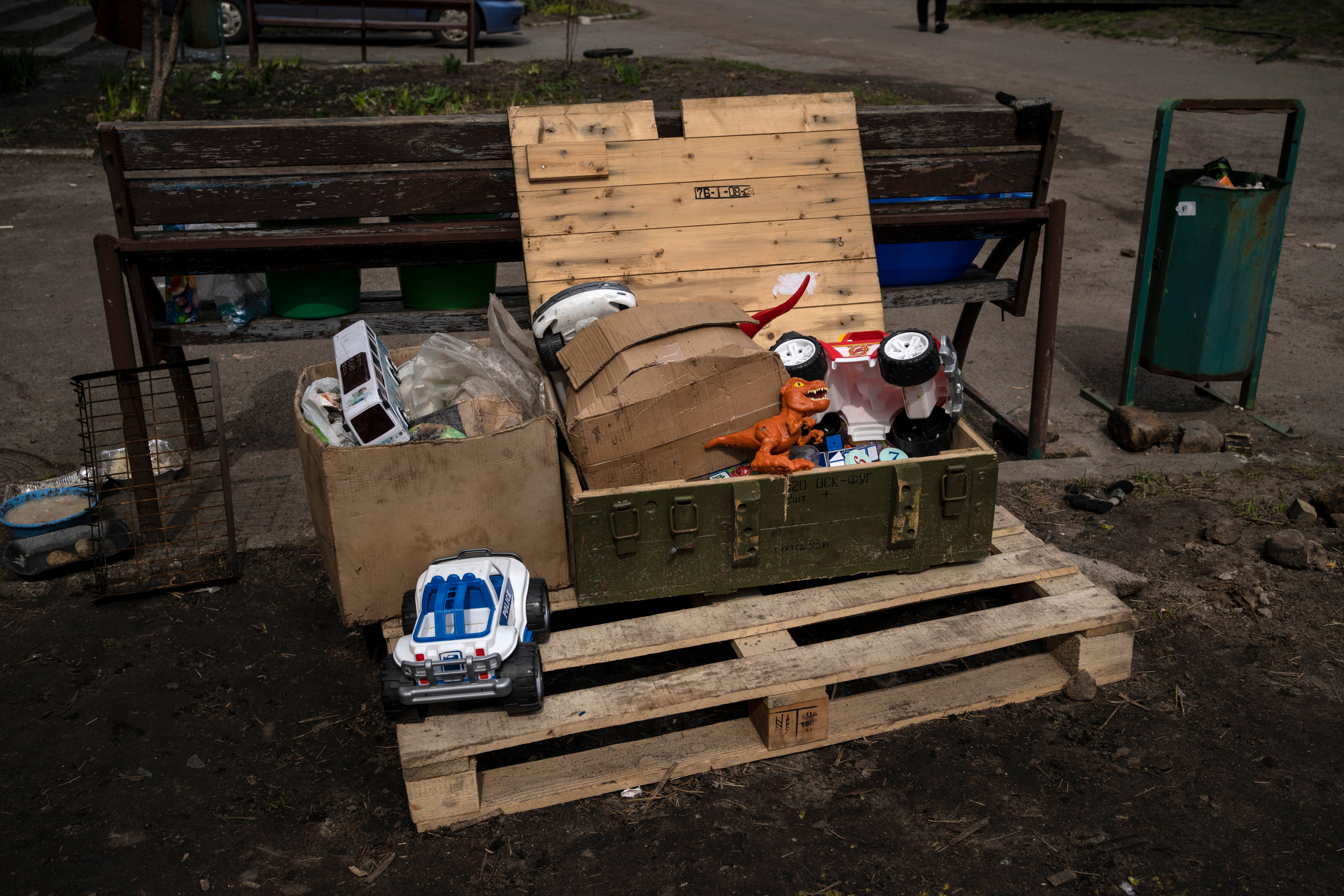 Children's toys are stored inside a box for military ammunition in Bucha, on the outskirts of Kyiv, Ukraine