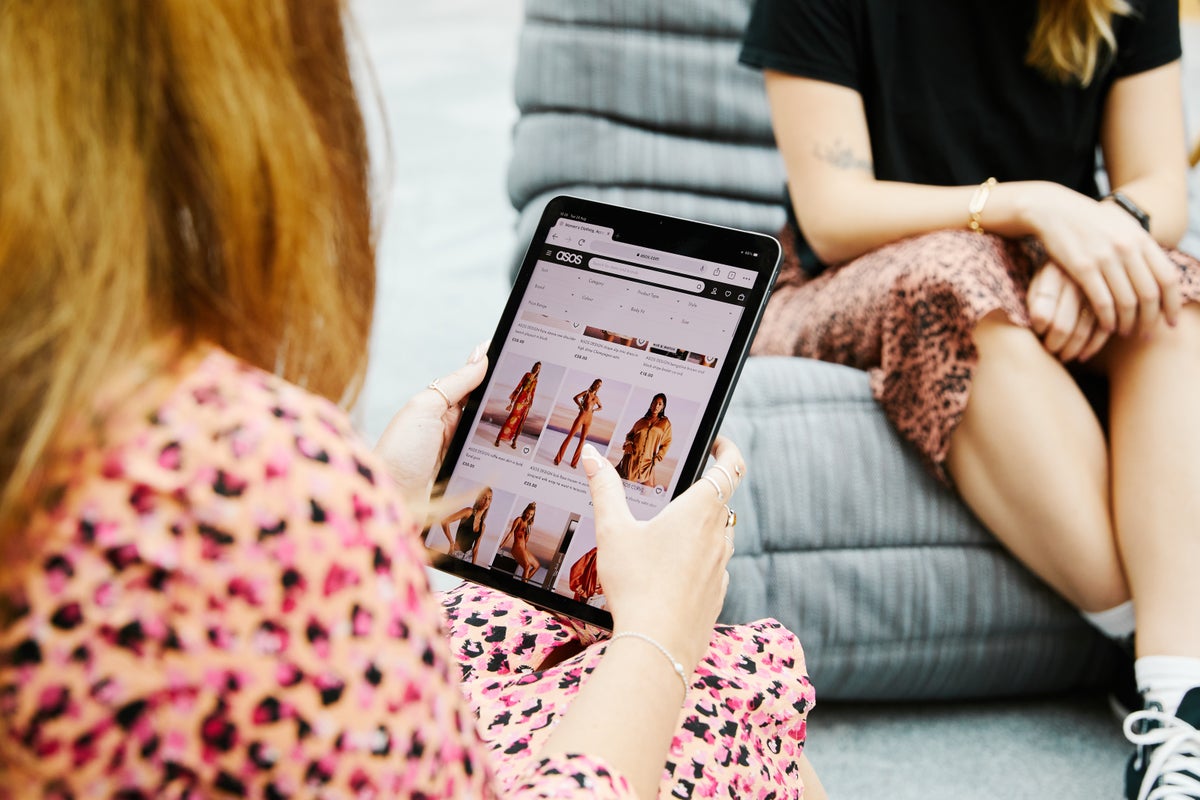 Asos lowers sales outlook amid challenging consumer environment