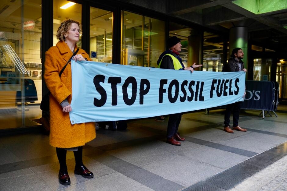 Protesters block the entrance to Lloyd’s of London