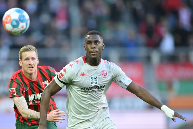 <p>Mainz defender Moussa Niakhate (right) during his side’s loss to Augsburg</p>