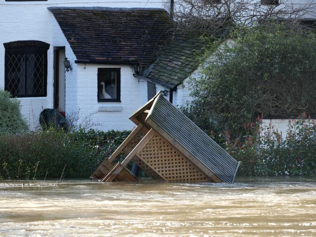 <p>Homes surrounded by flood water from the River Severn after successive storms </p>