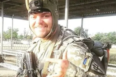 Briton who joined Ukrainian army pictured in handcuffs after being captured by Russian troops