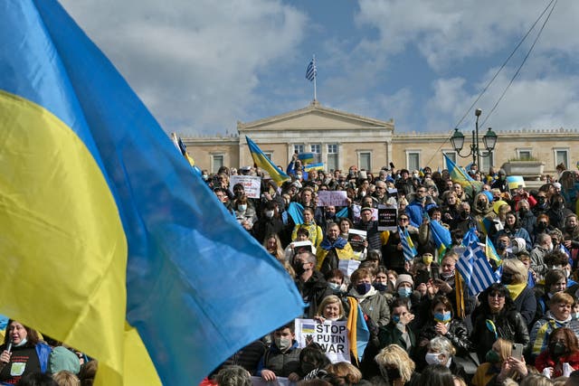 <p>Ukrainians and supporters gather during a demonstration in front of the Greek parliament in Athens against the Russian invasion of Ukraine</p>