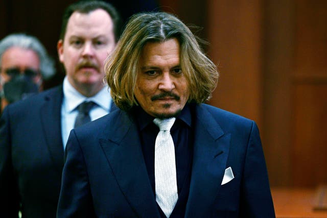 <p>Actor Johnny Depp walks into the courtroom at the Fairfax County Circuit Court in Fairfax, Virginia (Brendan Smialowski, Pool via AP)</p>
