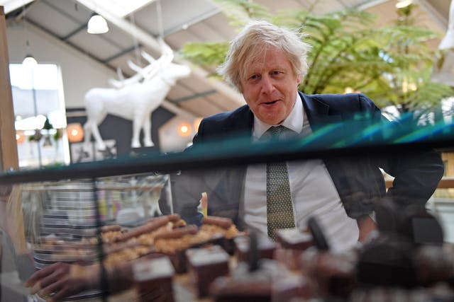 Prime Minister Boris Johnson was reportedly ‘ambushed’ by a cake in the Cabinet Room in June 2020 (Justin Tallis/PA)