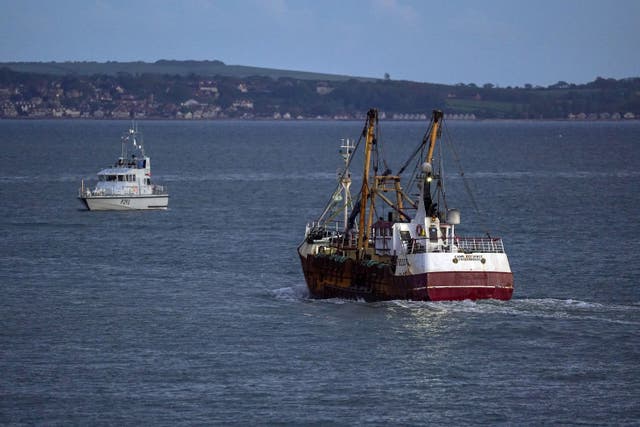 A fishing trawler leaves the harbour in Climate change will mean fewer fish species to catch in the future, study suggests (Steve Parsons/PA)