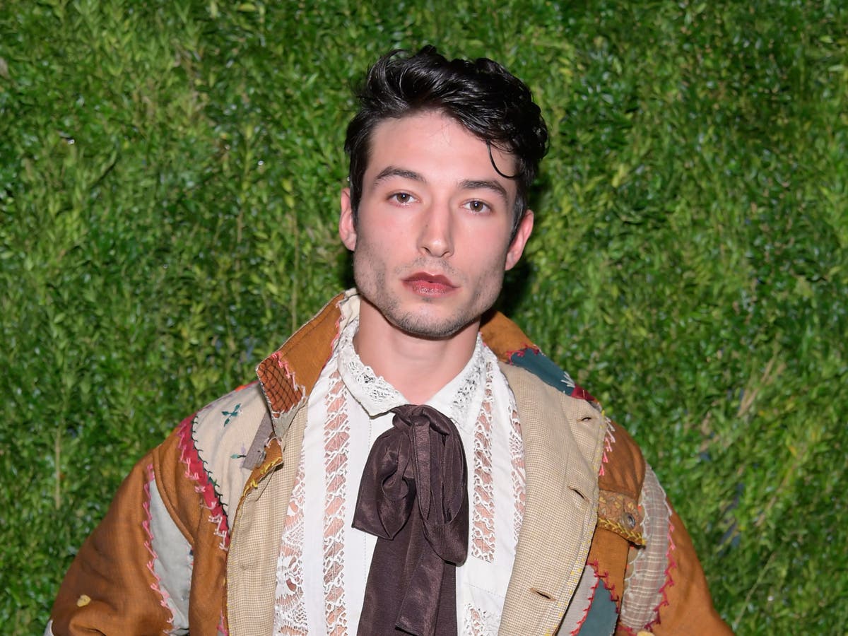 Ezra Miller claims they film themself getting assaulted for ‘NFT crypto art’ in bodycam footage - The Independent