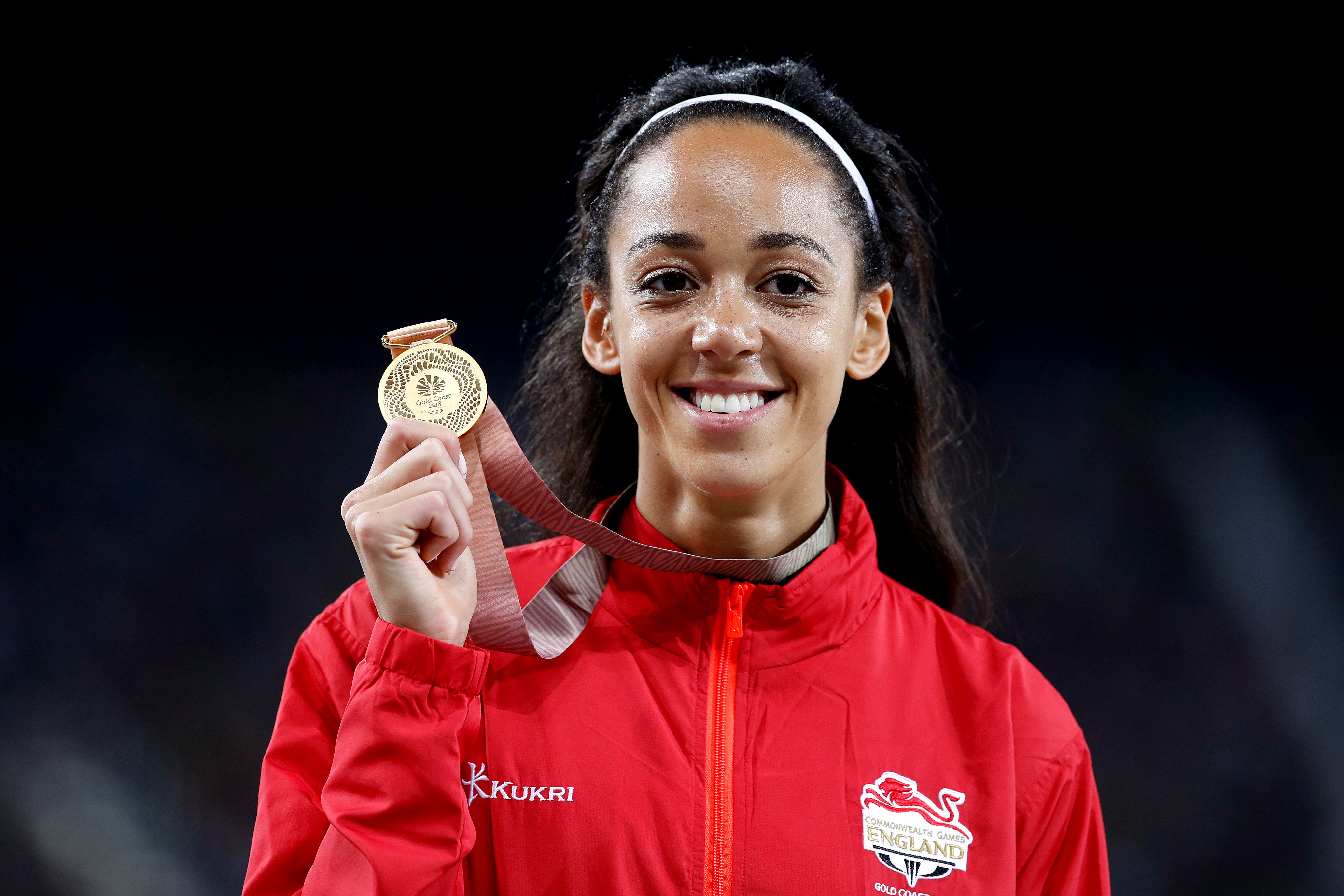 Katarina Johnson-Thompson celebrates with her gold medal at the 2018 Commonwealth Games (Martin Rickett/PA)