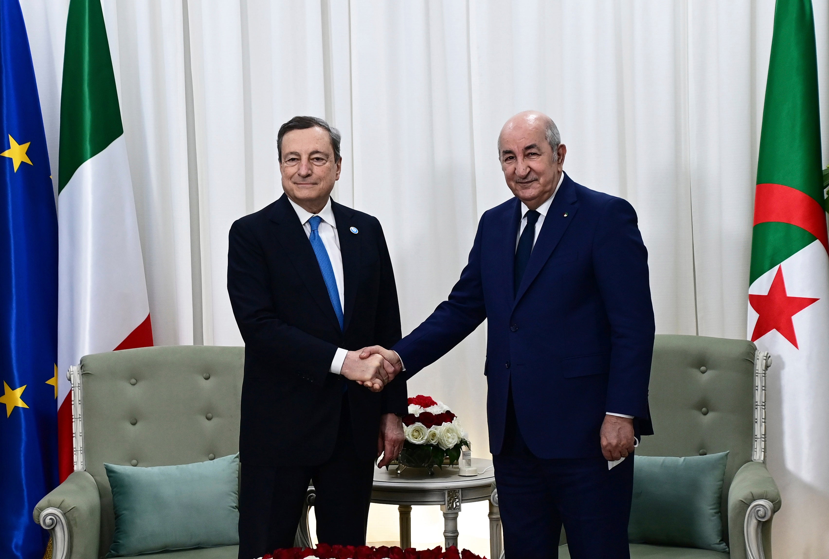 Algerian president Abdelmadjid Tebboune (right) shakes hands with Italian prime minister Mario Draghi in Algiers this week