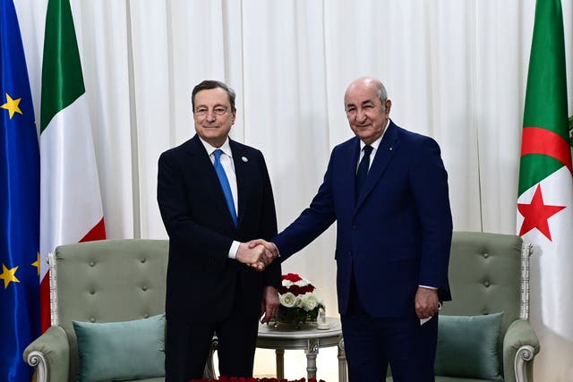 <p>Algerian president Abdelmadjid Tebboune (right) shakes hands with Italian prime minister Mario Draghi in Algiers this week </p>