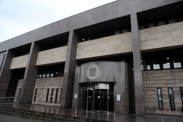 The trial is taking place at Glasgow Sheriff Court (Andrew Milligan/PA)