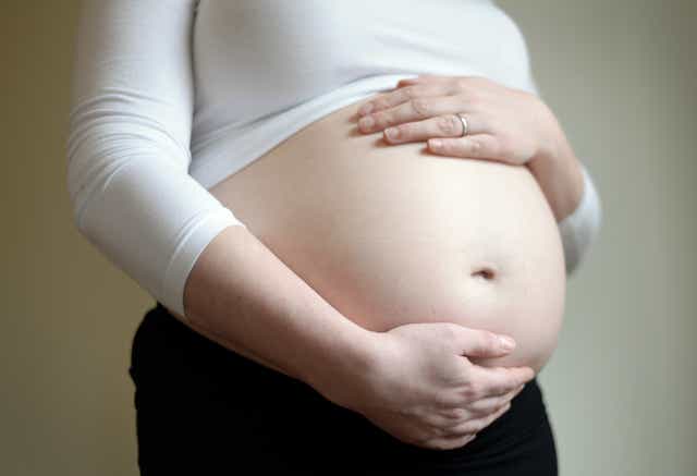 Poverty is already affecting the growth of unborn babies from as early as midway through pregnancy, a report has found (Andrew Matthews/PA)