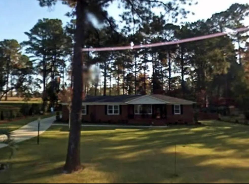 <p>The Thacker home just outside of Augusta National Golf Club in Georgia. The home was built by Herman and Elizabeth Thacker in 1959, and the couple refused to sell it to Augusta for years. Ms Thacker remains in the house to this day.</p>