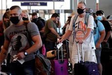 Biden administration to extend travel mask mandate as CDC monitors uptick in Covid-19 cases