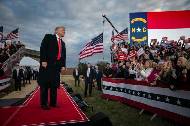 <p>Former U.S. President Donald Trump arrives at a rally at The Farm at 95 on April 9, 2022 in Selma, North Carolina. </p>