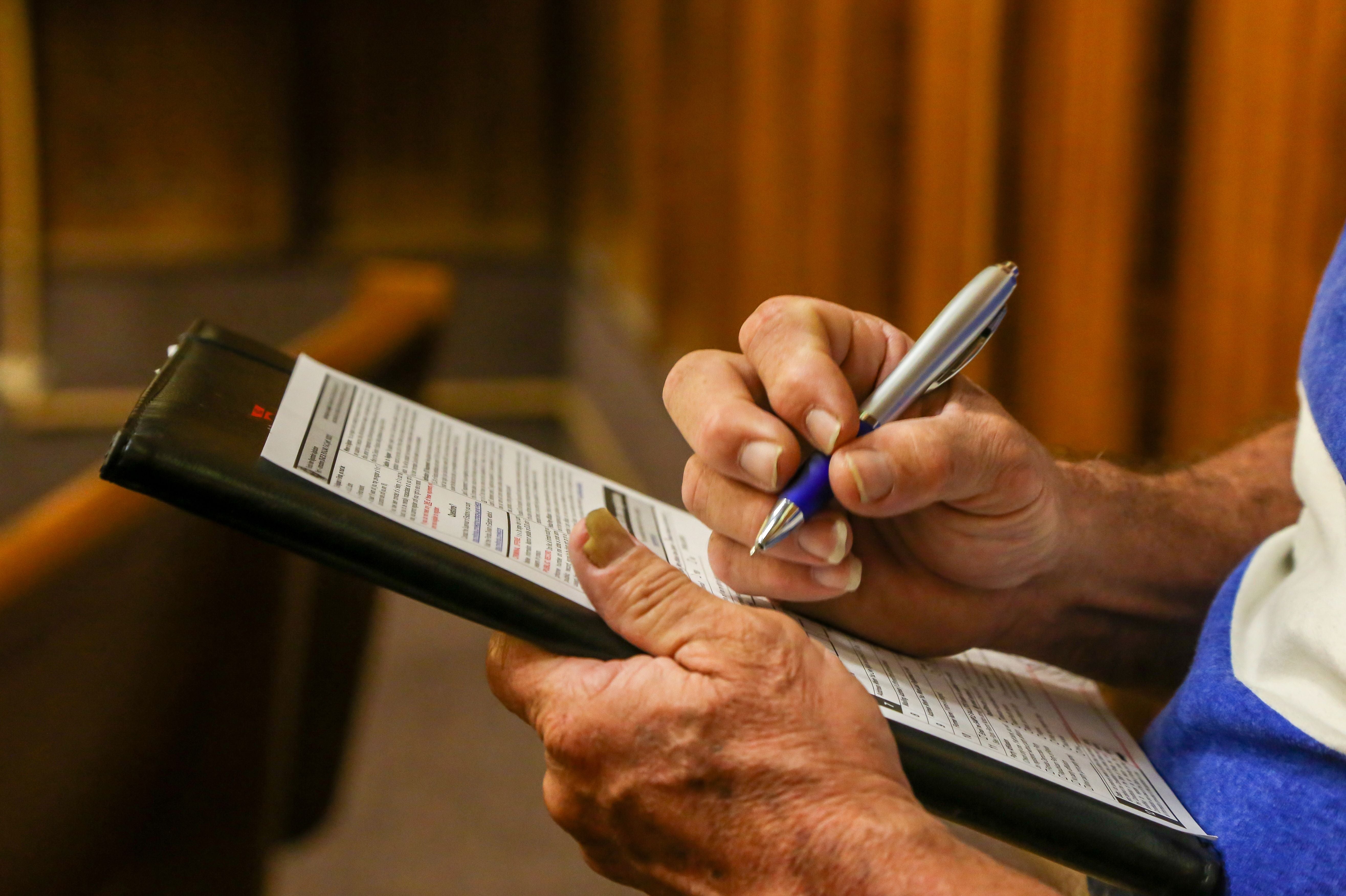 Francisco Jimenez, 60, registers to vote following a special court hearing aimed at restoring the right to vote under Florida's amendment 4 in a Miami-Dade County courtroom on November 8, 2019, in Miami, Florida