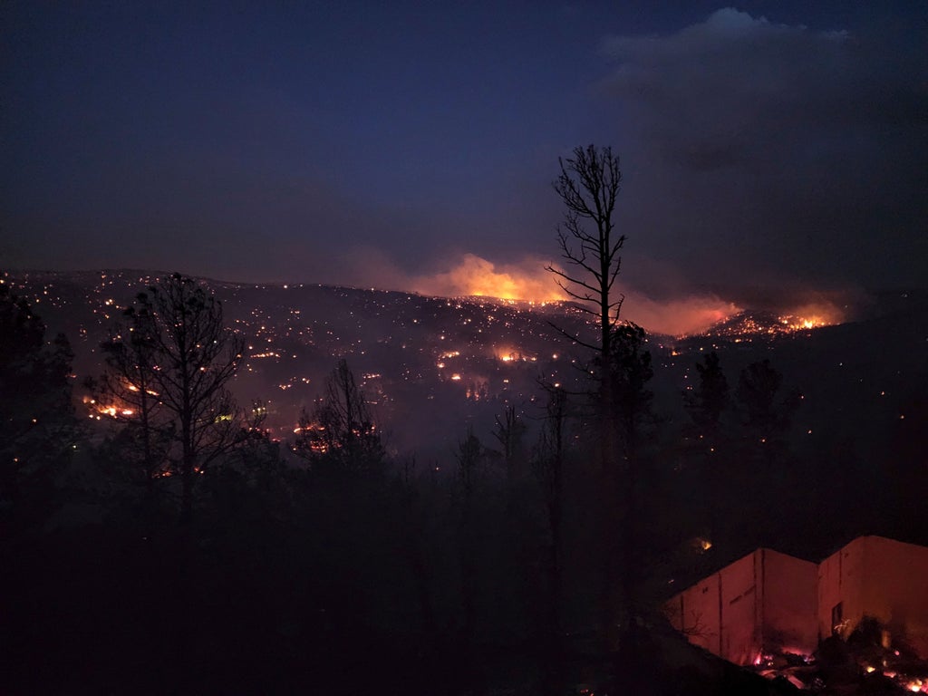 Destructive wildfires rage in New Mexico, Colorado