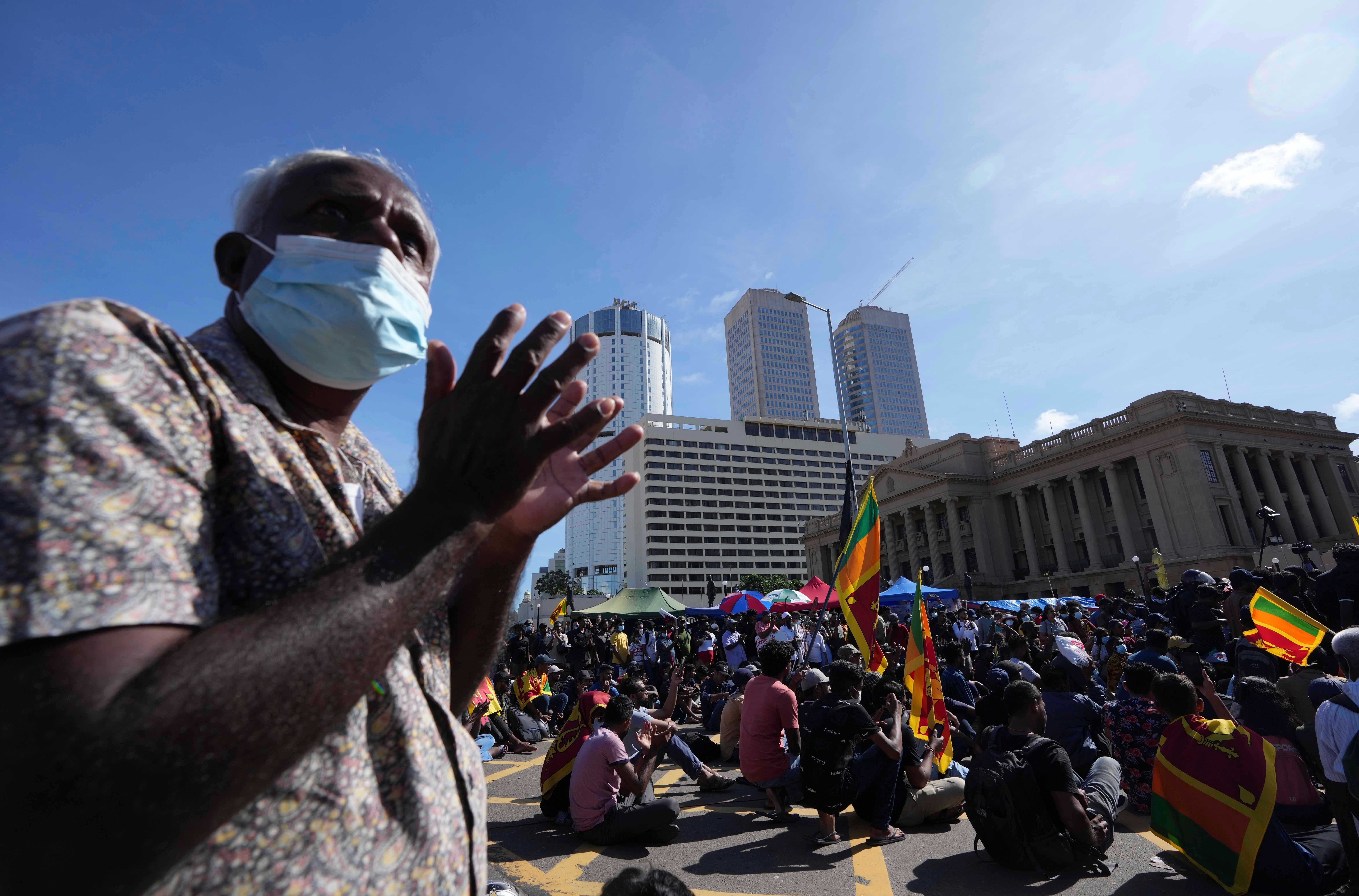 Sri Lankans celebrate Sinhalese and Tamil new year at a protest site near the president’s office in Colombo on 14 April