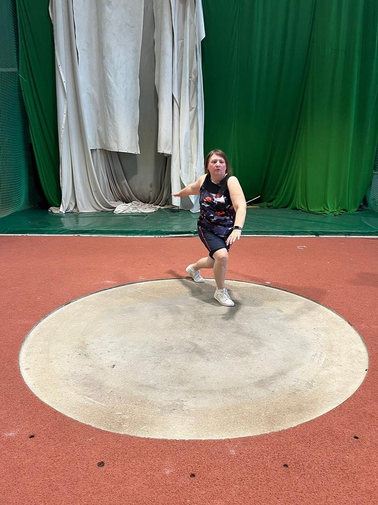 Denise Kidger practicing throwing the discus (Denise Kidger and PA)