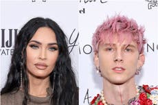 Awkward video shows unimpressed Megan Fox swerving fiancé Machine Gun Kelly’s kiss on red carpet